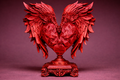 Statuetta decorativa - Emblema dal cuore alato